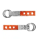 Schlüsselanhänger aus genarbtem Leder in Orange mit naturfarbenen Nähten